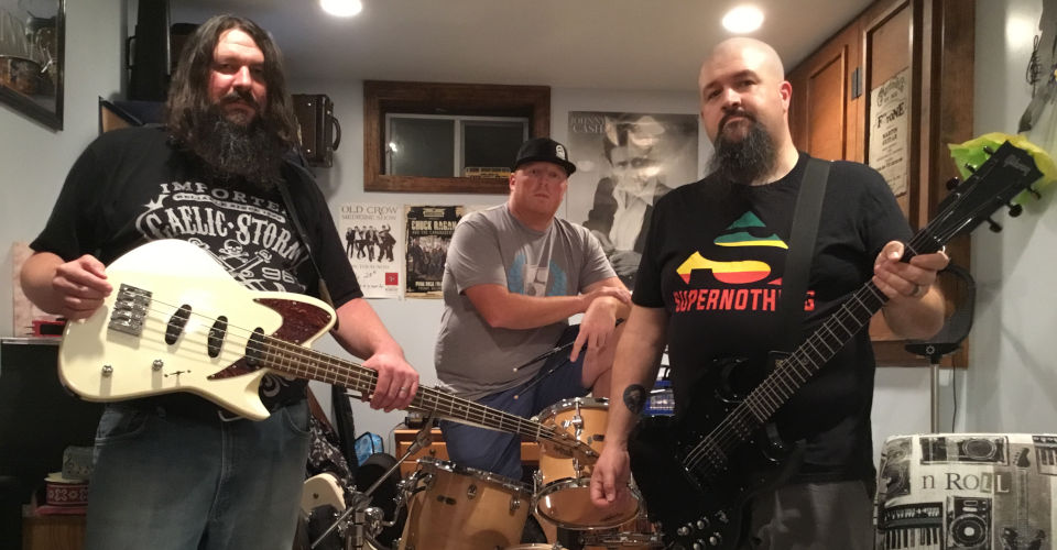 Featured web slider photo of New England power pop punk rock n roll band, Nostalgic Distortion. Left to right Ryan Byrne, Marc Sheehan, Tim Hazelton.